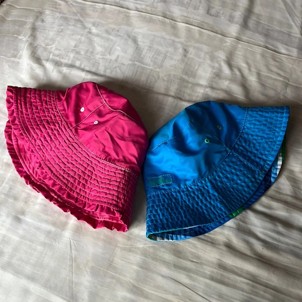 UV Skinz kids fuchsia and blue bucket hats in size 6 and 7